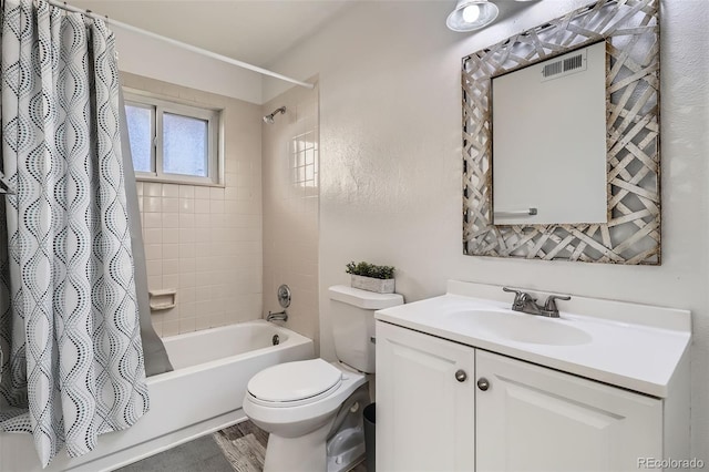 full bathroom with vanity, hardwood / wood-style floors, toilet, and shower / bath combo