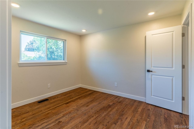 9410 Perry St, Westminster, CO 80031 - unfurnished room with dark wood-style floors and recessed lighting
