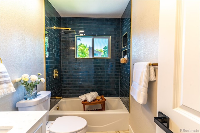 9410 Perry St, Westminster, CO 80031 - full bathroom with vanity, a textured wall, and shower / tub combination
