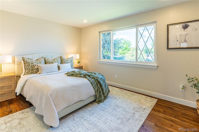 9410 Perry St, Westminster, CO 80031 - bedroom featuring baseboards and wood finished floors