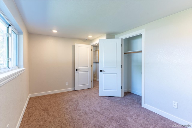 9410 Perry St, Westminster, CO 80031 - unfurnished bedroom with carpet floors, a closet, and recessed lighting