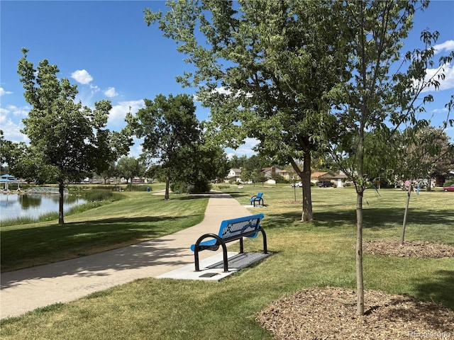9410 Perry St, Westminster, CO 80031 - surrounding community featuring a lawn and a water view