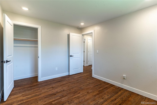 9410 Perry St, Westminster, CO 80031 - unfurnished bedroom with dark wood finished floors, a closet, and recessed lighting