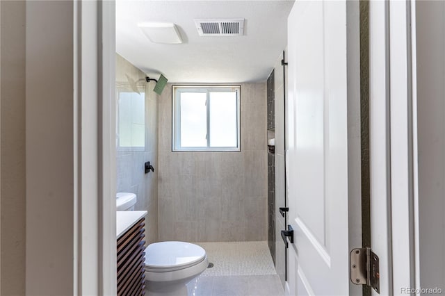 9410 Perry St, Westminster, CO 80031 - bathroom with tiled shower and vanity