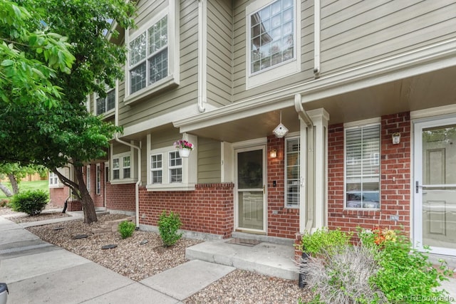 9110 Gale Blvd Unit 3, Thornton, CO 80260 - doorway to property featuring brick siding