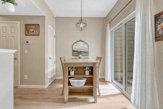 9110 Gale Blvd Unit 3, Thornton, CO 80260 - dining room with wood finished floors and baseboards