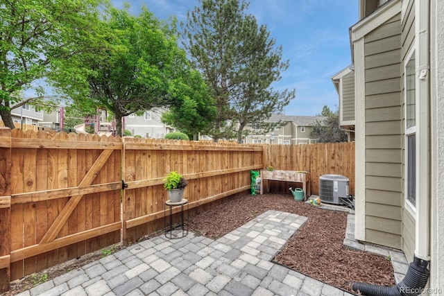 9110 Gale Blvd Unit 3, Thornton, CO 80260 - fenced backyard with central AC and a patio area