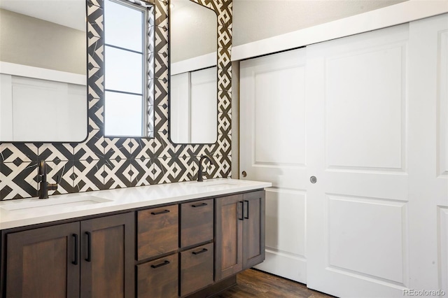 bathroom featuring vanity and hardwood / wood-style floors