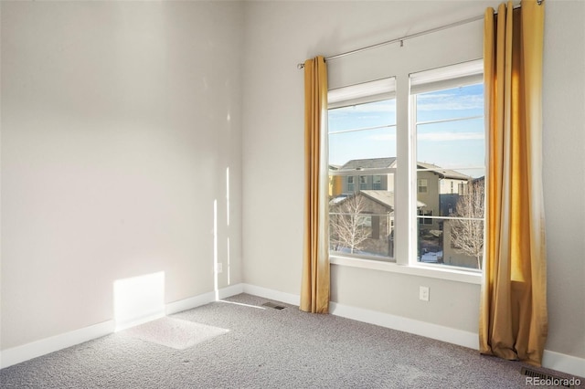 empty room featuring carpet