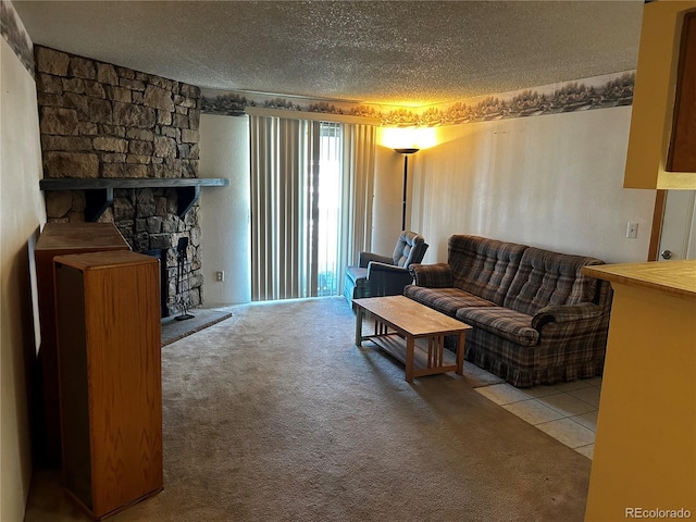 carpeted living room with a textured ceiling and a stone fireplace