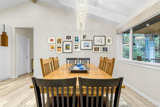 14960 Spiritwood Loop, Elbert, CO 80106 - dining space with vaulted ceiling, a chandelier, and light wood-type flooring