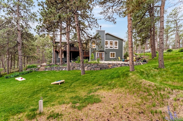 14960 Spiritwood Loop, Elbert, CO 80106 - back of house with a wooden deck