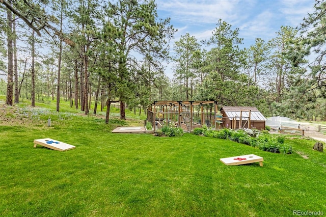 14960 Spiritwood Loop, Elbert, CO 80106 - view of grassy yard with an outdoor structure
