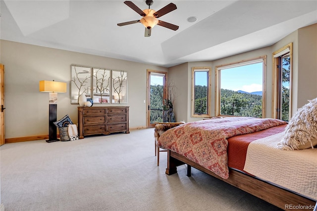 1007 Nob Hill Rd, Evergreen, CO 80439 - bedroom with access to exterior, baseboards, carpet flooring, and ceiling fan