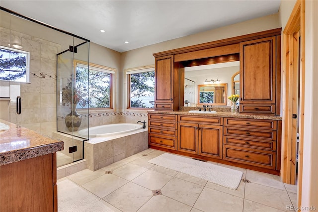 1007 Nob Hill Rd, Evergreen, CO 80439 - full bathroom featuring vanity, a bath, and tile patterned floors