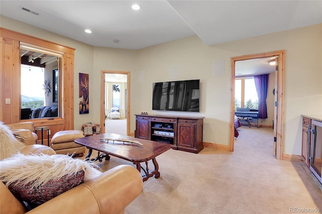 1007 Nob Hill Rd, Evergreen, CO 80439 - living room with light colored carpet, baseboards, and recessed lighting
