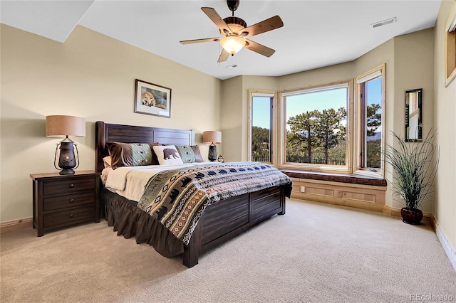 1007 Nob Hill Rd, Evergreen, CO 80439 - bedroom with light carpet, baseboards, and a ceiling fan