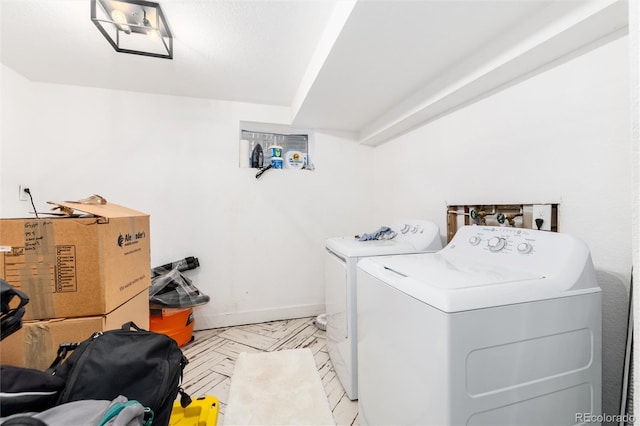 4800 S Tabor St, Morrison, CO 80465 - laundry room featuring separate washer and dryer and baseboards