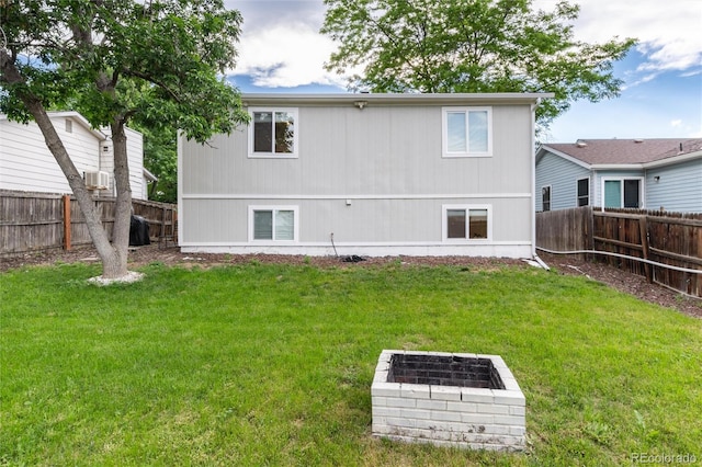 4800 S Tabor St, Morrison, CO 80465 - rear view of house featuring a fenced backyard and cooling unit