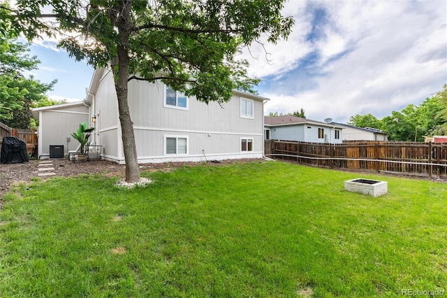 4800 S Tabor St, Morrison, CO 80465 - rear view of property featuring a fenced backyard