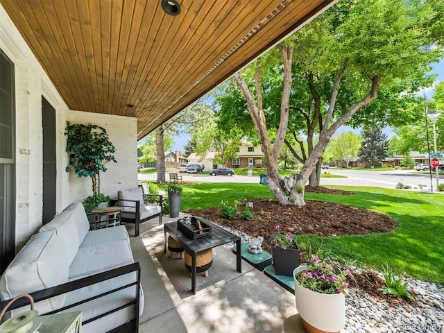 6111 W Fremont Dr, Littleton, CO 80128 - view of patio / terrace featuring an outdoor hangout area