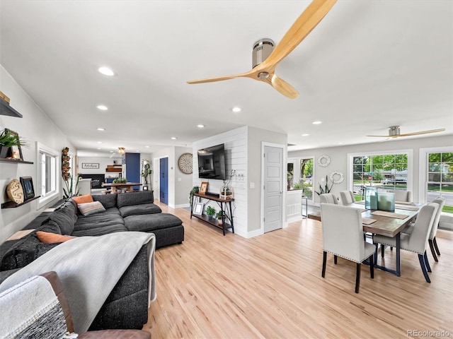 6111 W Fremont Dr, Littleton, CO 80128 - living area with ceiling fan, recessed lighting, and light wood finished floors