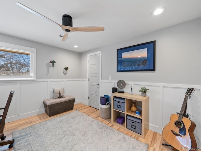 6111 W Fremont Dr, Littleton, CO 80128 - office space with a ceiling fan, a wainscoted wall, wood finished floors, a decorative wall, and recessed lighting