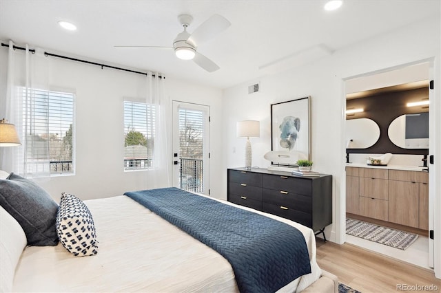 5128 W 26th Ave Unit 312, Denver, CO 80212 - bedroom with light wood-style flooring, access to outside, ceiling fan, recessed lighting, and ensuite bathroom