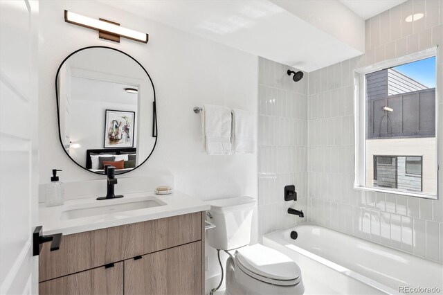 5128 W 26th Ave Unit 312, Denver, CO 80212 - bathroom featuring bathtub / shower combination and vanity