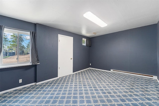 9185 Jill Dr, Conifer, CO 80433 - spare room with a baseboard radiator, carpet flooring, and baseboards