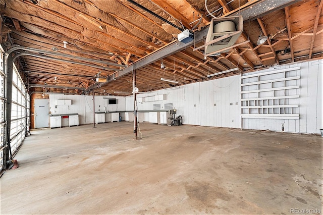9185 Jill Dr, Conifer, CO 80433 - garage featuring a garage door opener