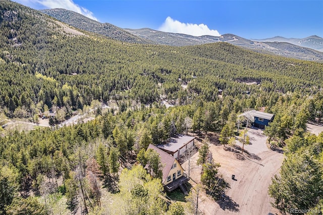 9185 Jill Dr, Conifer, CO 80433 - view of mountain backdrop featuring a forest