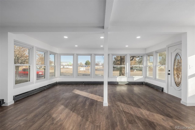 interior space featuring beamed ceiling and a baseboard radiator