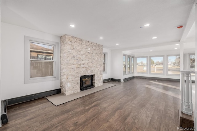 unfurnished living room with wood-type flooring