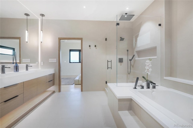 bathroom featuring a garden tub, vanity, visible vents, and a stall shower