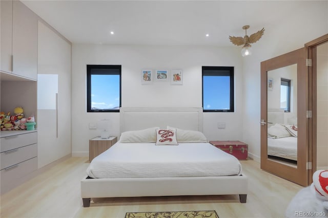 bedroom featuring light wood finished floors