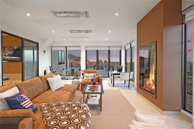 living room with recessed lighting and visible vents