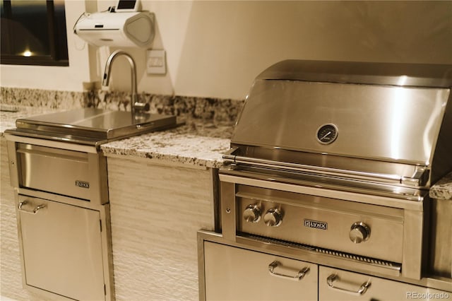 kitchen featuring light stone counters
