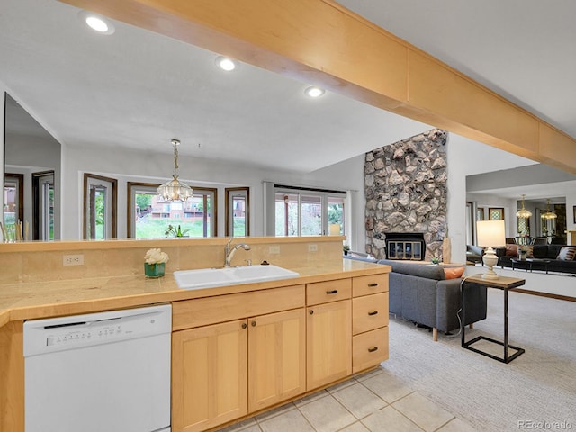 12658 W 1st Pl Unit 78, Denver, CO 80228 - kitchen featuring dishwasher, light brown cabinets, open floor plan, a fireplace, and light countertops