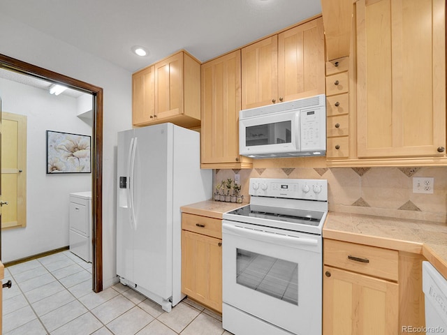 12658 W 1st Pl Unit 78, Denver, CO 80228 - kitchen with white appliances, light brown cabinets, washer / dryer, decorative backsplash, and recessed lighting