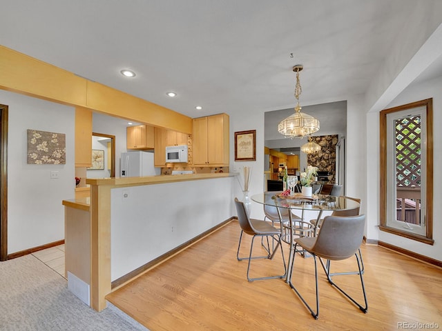 12658 W 1st Pl Unit 78, Denver, CO 80228 - dining room with a chandelier, light wood-style floors, and recessed lighting