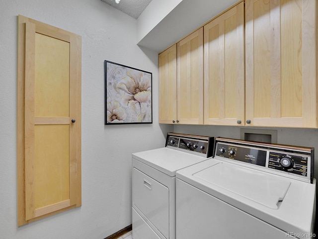 12658 W 1st Pl Unit 78, Denver, CO 80228 - laundry area with separate washer and dryer and cabinet space