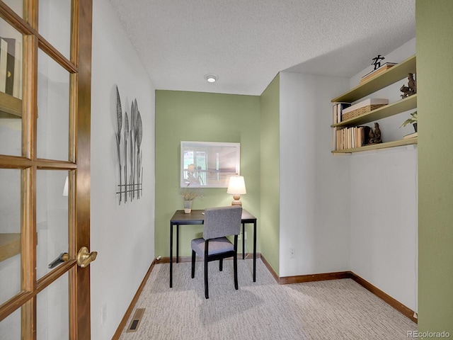 12658 W 1st Pl Unit 78, Denver, CO 80228 - carpeted office featuring a textured ceiling