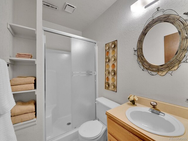 12658 W 1st Pl Unit 78, Denver, CO 80228 - bathroom with a stall shower and vanity