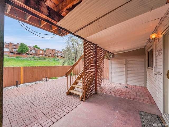 12658 W 1st Pl Unit 78, Denver, CO 80228 - fenced backyard with a patio area, stairs, and a residential view