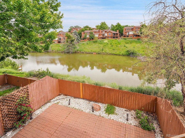 12658 W 1st Pl Unit 78, Denver, CO 80228 - view of patio / terrace featuring a water view and a residential view