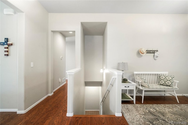 1210 Muskox St, Severance, CO 80550 - hall with an upstairs landing and wood finished floors