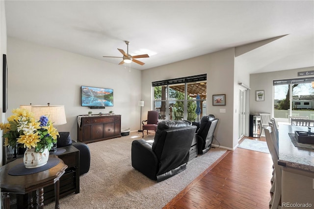 1210 Muskox St, Severance, CO 80550 - living area with ceiling fan and wood finished floors