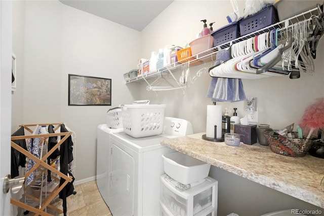 1210 Muskox St, Severance, CO 80550 - laundry room with washer and clothes dryer and baseboards