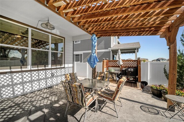 1210 Muskox St, Severance, CO 80550 - view of patio featuring outdoor dining area and a pergola